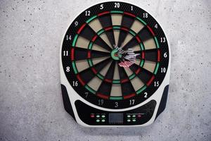 Dartboard game on wall photo