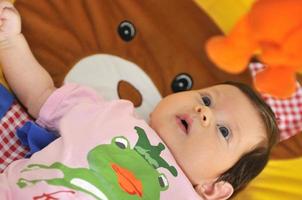 indoor portrait with happy young famil and  cute little babby photo