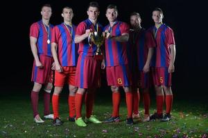 soccer players celebrating victory photo