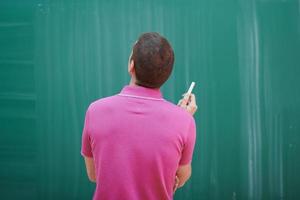 the student does the task on the board photo