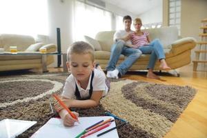 family drawing on school board at home photo