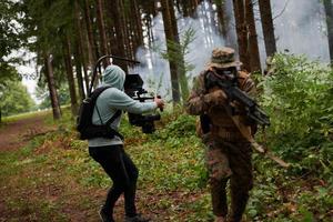 Videographer Taking Action Shoot of Soldiers in Action photo