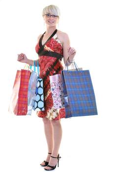 happy young adult women  shopping with colored bags photo