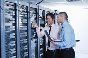 it enineers in network server room photo