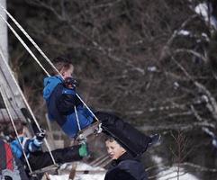 kids playing with  fresh snow photo