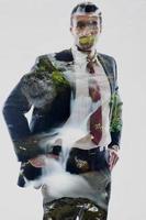 double exposure of business man and creek in forest background photo