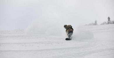 Skiers on mountain photo