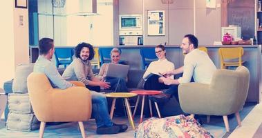 Startup Business Team At A Meeting at modern office building photo