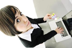 business woman making online money transaction photo