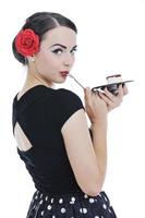 pinup retro  woman with travel bag isolated photo