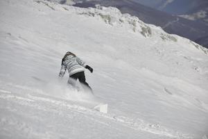 Skiers on mountain photo