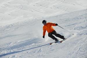 Skiers on mountain photo