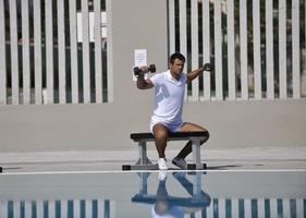 Exercising by pool photo