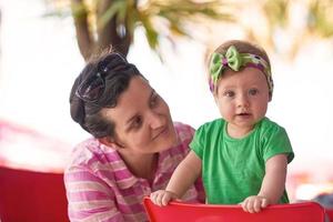 portrait of happy young mother and baby photo