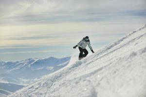 Skiers on mountain photo