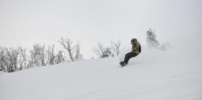 Skier on mountain photo