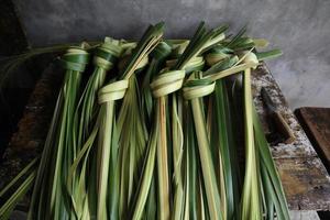 young coconut leaves. young coconut leaves used to make ketupat food photo