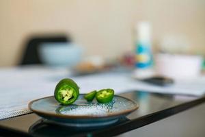 Sliced jalapeno chili peppers photo