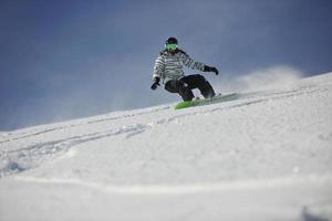 Skiers on mountain photo