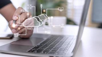 Businessman with cloud computing diagram show on hand. Cloud technology. Data storage. Networking and internet service concept. photo