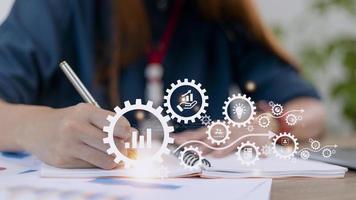 Business planning concepts, high-performance business processes and workflows and problem solving, quality control and long-term business evaluation tracking. photo