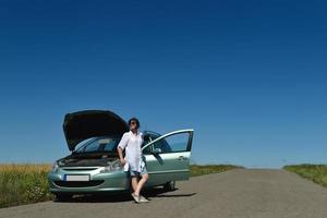 woman with broken car photo