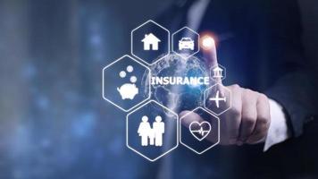 Online insurance on virtual screen. Life, car, property, health and family. Internet and digital technology concept. photo