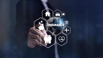 Online insurance on virtual screen. Life, car, property, health and family. Internet and digital technology concept. photo
