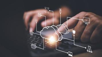 Businessman with cloud computing diagram show on hand. Cloud technology. Data storage. Networking and internet service concept. photo