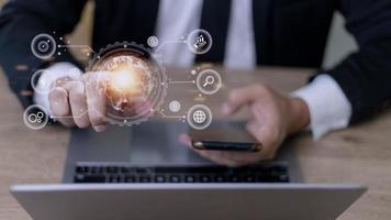 Businessman using mobile smart phone. Business global internet connection application technology and digital marketing, Financial and banking, Digital link tech, big data. photo