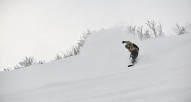 Skiers on mountain photo