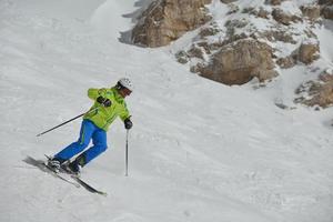 Skiers on mountain photo