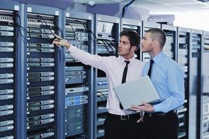 it enineers in network server room photo