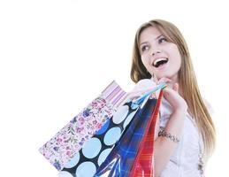 mujeres adultas jóvenes felices comprando con bolsas de colores foto