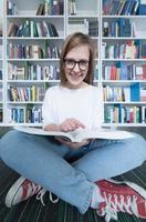 Student studying in library photo