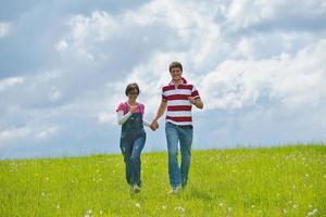 romantic young couple in love together outdoor photo