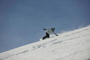 Skiers on mountain photo