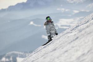 Skiers on mountain photo