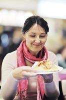 woman eat pizza food at restaurant photo