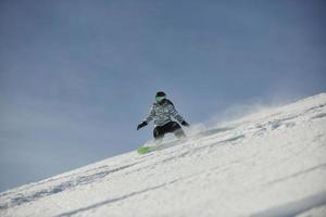 Skiers on mountain photo