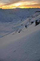 mountain snow sunset photo