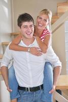 Relaxed young  couple watching tv at home photo