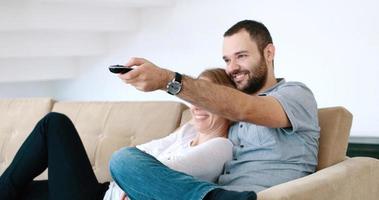 senoior couple watching tv in modern villa photo