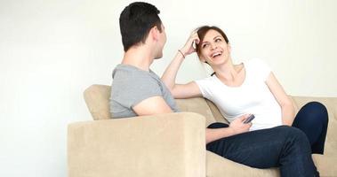 Young Couple using digital tablet at home photo