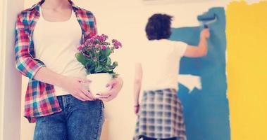 happy young couple doing home renovations photo