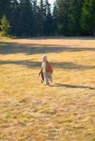 Child playing outside photo