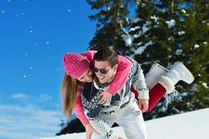 Young Couple In Winter  Snow Scene photo