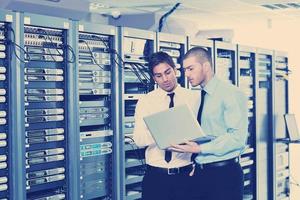 it enineers in network server room photo