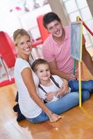 family drawing on school board at home photo