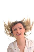 mujer de fiesta aislada con viento en el cabello foto